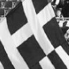 Greeks and Serbs fly their flags on the field after the friendly football match in Belgrade.