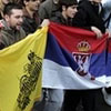 The Eastern Roman and Serbian flags side-by-side during the Serbian protest in Belgrade over Kosovo.